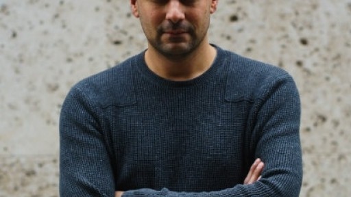 Head and shoulders photo of author and presenter Adam Rutherford