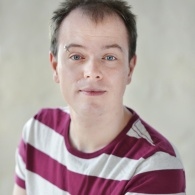 Poet and childrens author Dominic Berry aka Dommy B in a stripey tee-shirt