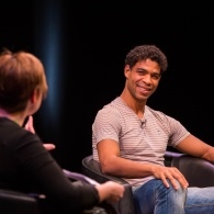 Writer and Dancer Carlos Acosta smiling onstage at The Lowry during MLF13