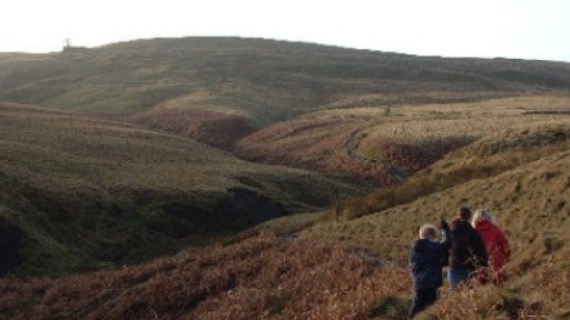 Image of the moors near Haworth, with Top Withins farm on the horizon