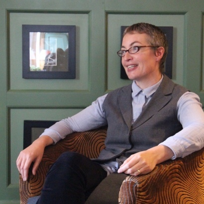 Image of Kate Clanchy sat in chair at the Midland Hotel