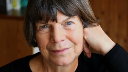 Image of Margaret Drabble looking straight at the camera with her head resting on her hand