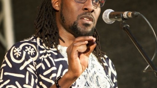 Image of Nii Parkes in action at the microphone
