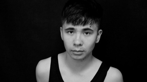 Young Vietnamese American poet Ocean Vuong in black and white