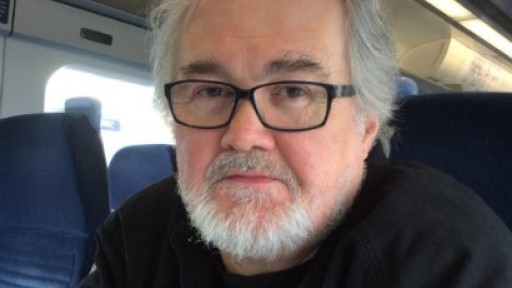 Headshot of Sean O'Brien, sitting on a train