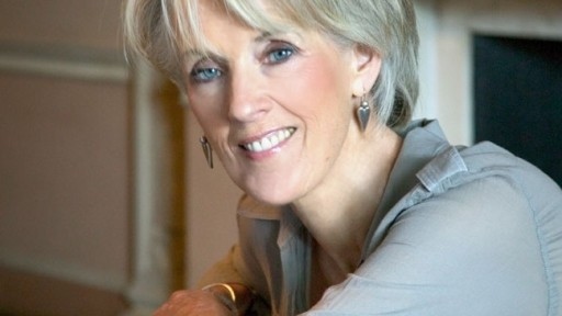 Acclaimed author Joanna Trollope infront of a period fireplace.