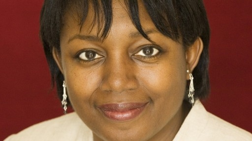 Acclaimed writer and childrens laureate Malorie Blackman smiling.