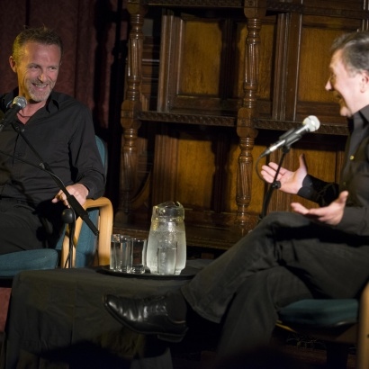 Jo Nesbo and Barry Forshaw in conversation on stage at Manchester Town Hall