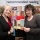 MLF board member stands with poet laureate Carol Ann Duffy in a library